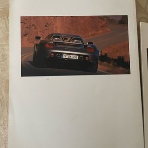 Porsche Product knowledge Carrera Book, and Brochure.